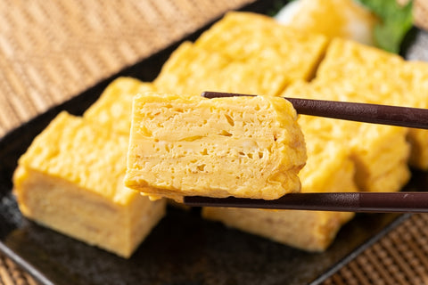 Japanese omelette. Tamagoyaki. Japanese Rolled Omelet. Japanese families have it for breakfast