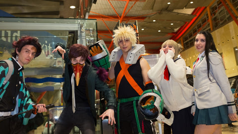 Young people dressed in cosplay of anime characters with other accessories