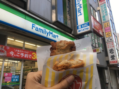 Hot Fried Chicken and Croquette in paper bag in front of Family Mart. With a lot of seasonal flavors