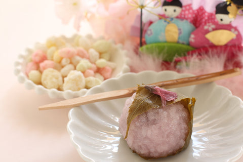 Japanese confectionery, hand made doll and Sakura mochi for Hinamatsuri (girl's day)
