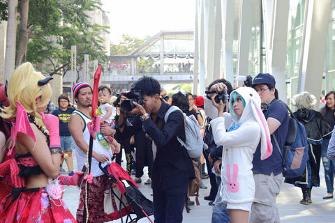 Anime character cosplay pose for photographers