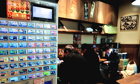 Vending machines for order the meal in Japanese restaurant and Customers waiting for food