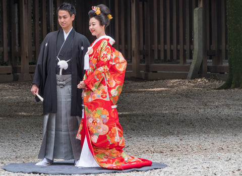 Bride and groom wearing traditional Japanese wedding outfit