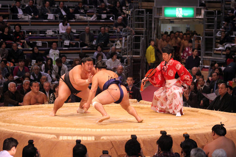 Sumo wrestlers ready to engage in the arena
