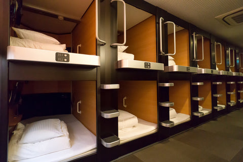 Rows of capsules in a capsule hotel.