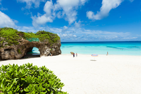 Paradise white sand tropical beach on coral lagoon island, Miyako Island, Okinawa, Japan