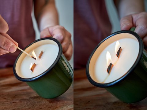 A woman lighting a double wood wick candle, and the candle when it's fully lit.