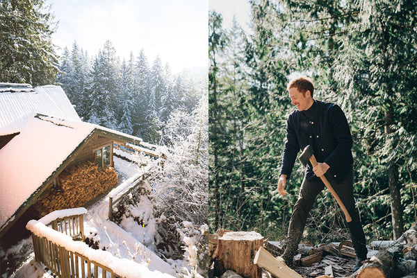 Joel Fuller chopping wood at a secluded cabin in the winter