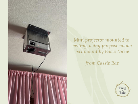 A projector setup by Cassie Rae - a mini projector is mounted to the ceiling with a purpose-made Basic Niche ceiling mount