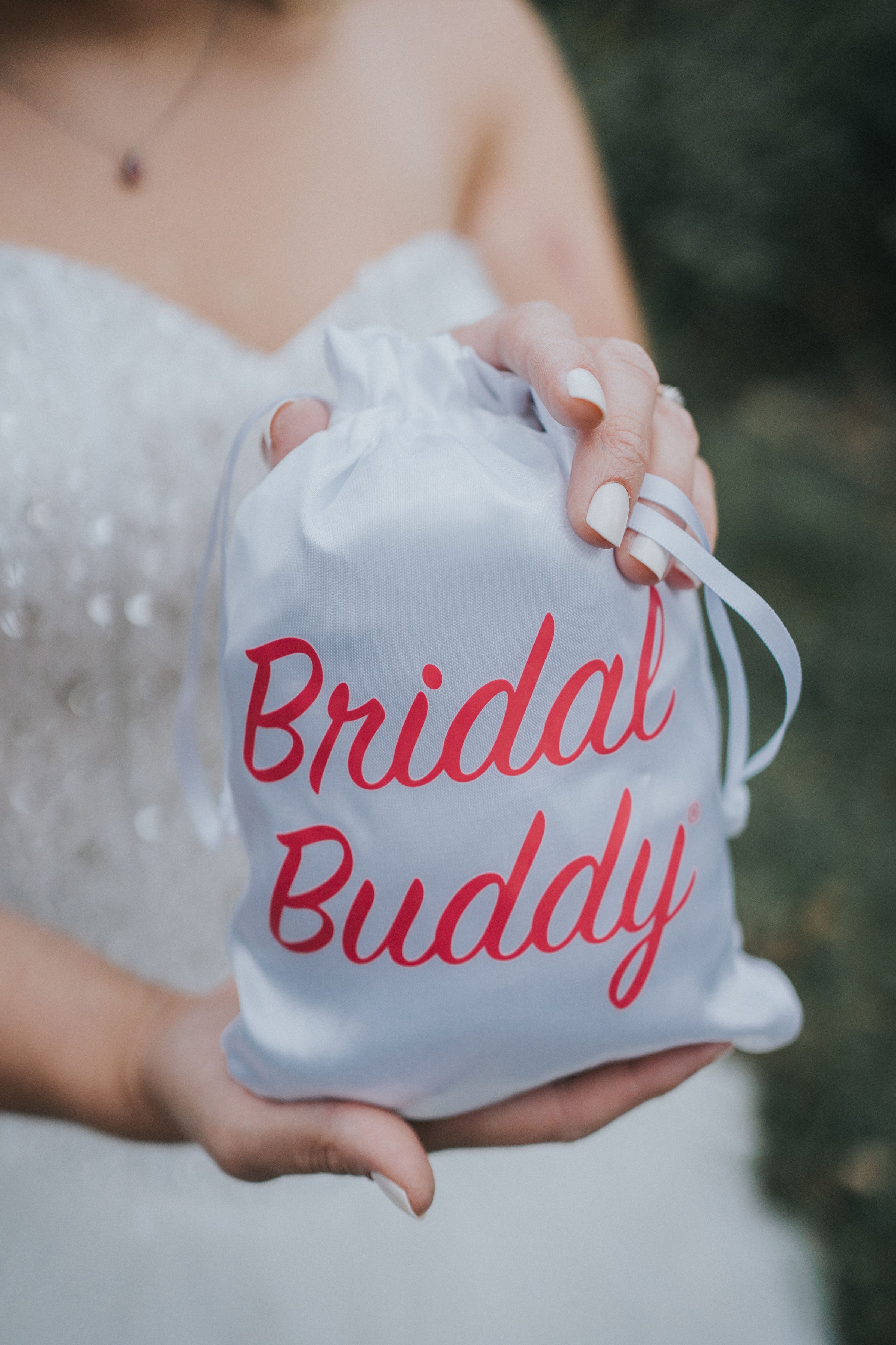 The Bridal Buddy allows brides to use the toilet without