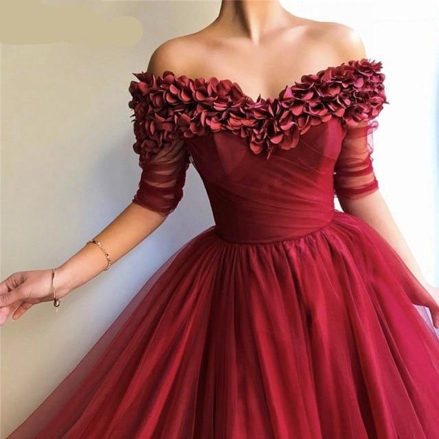 red off shoulder evening gown