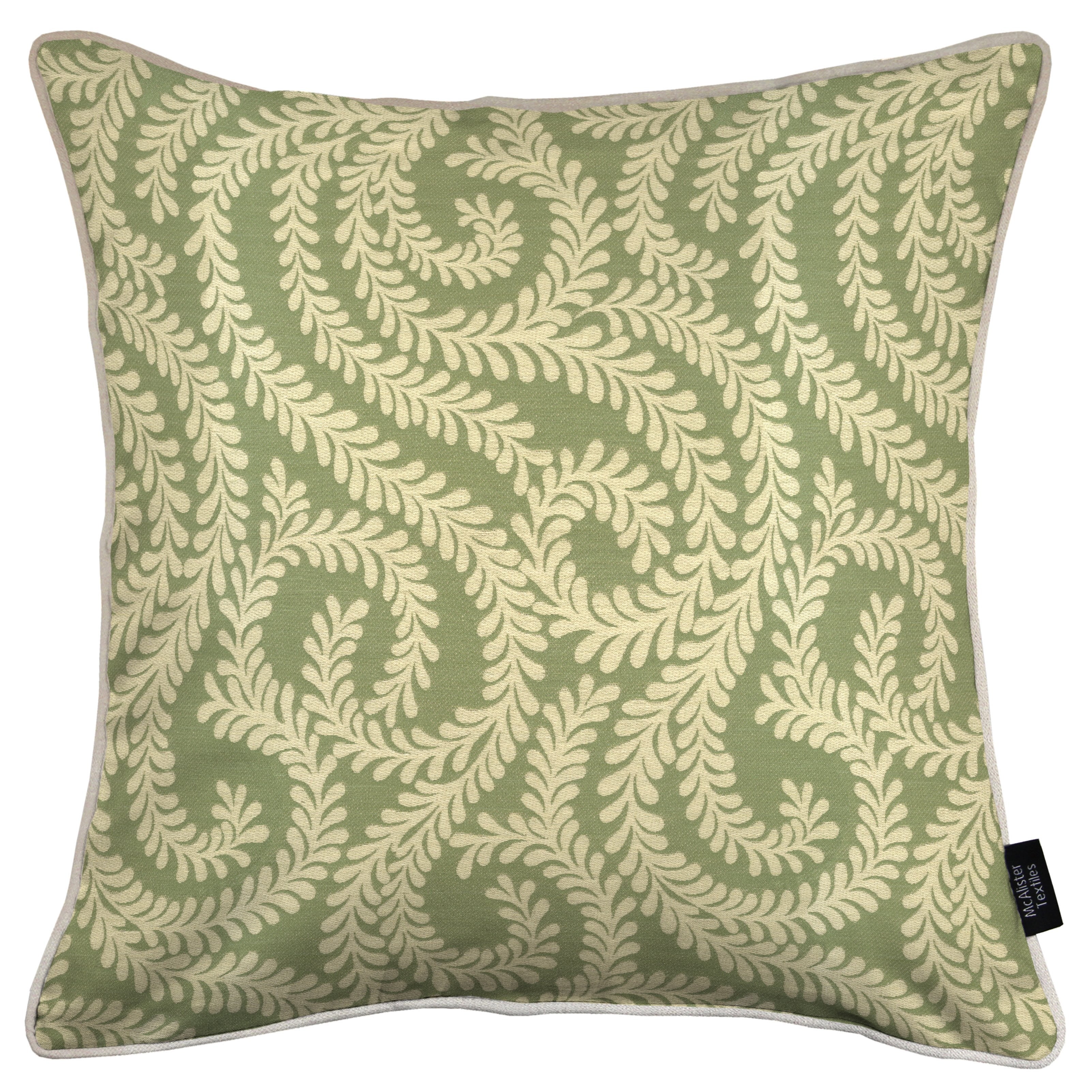 sage green cushions and throws