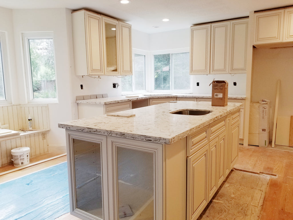 Simple Cloud White Kitchen Cabinets With White Appliances for Large Space