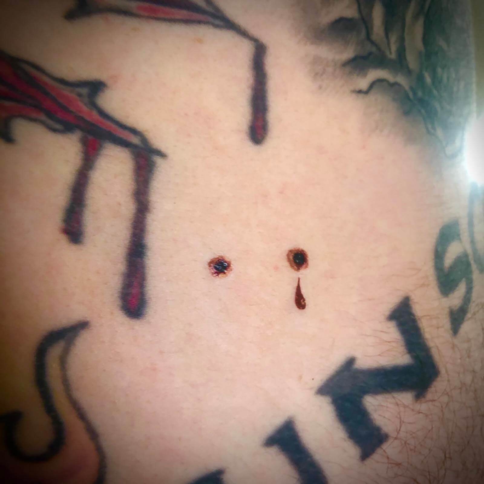 Vampire Bite tattoo