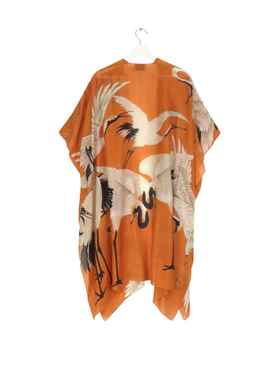 This One Hundred Stars Stork Orange Throwover looks great over beachwear or over your favourite long sleeved top in cooler months.