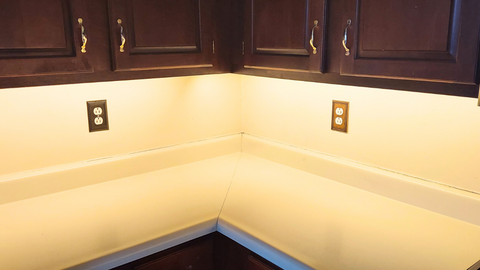 under cabinet led lights on shining onto the counters without creating any glare