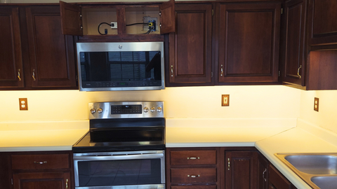 full view of the LED lighting under the cabinets turned on