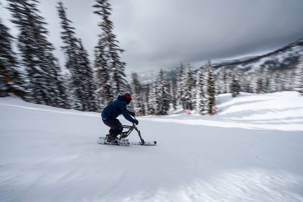 SNOGO Ski Biker Descends A Mountain