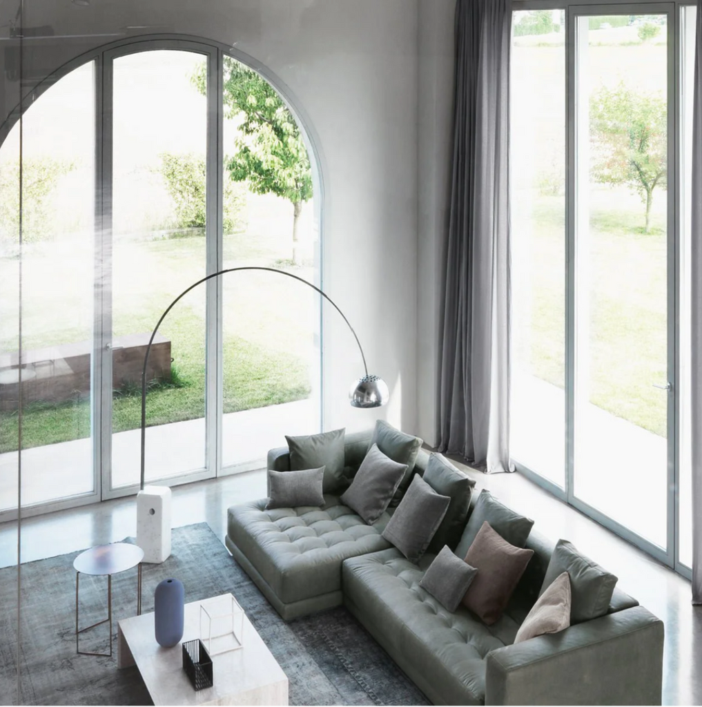 arco arch floor lamp in modern living room