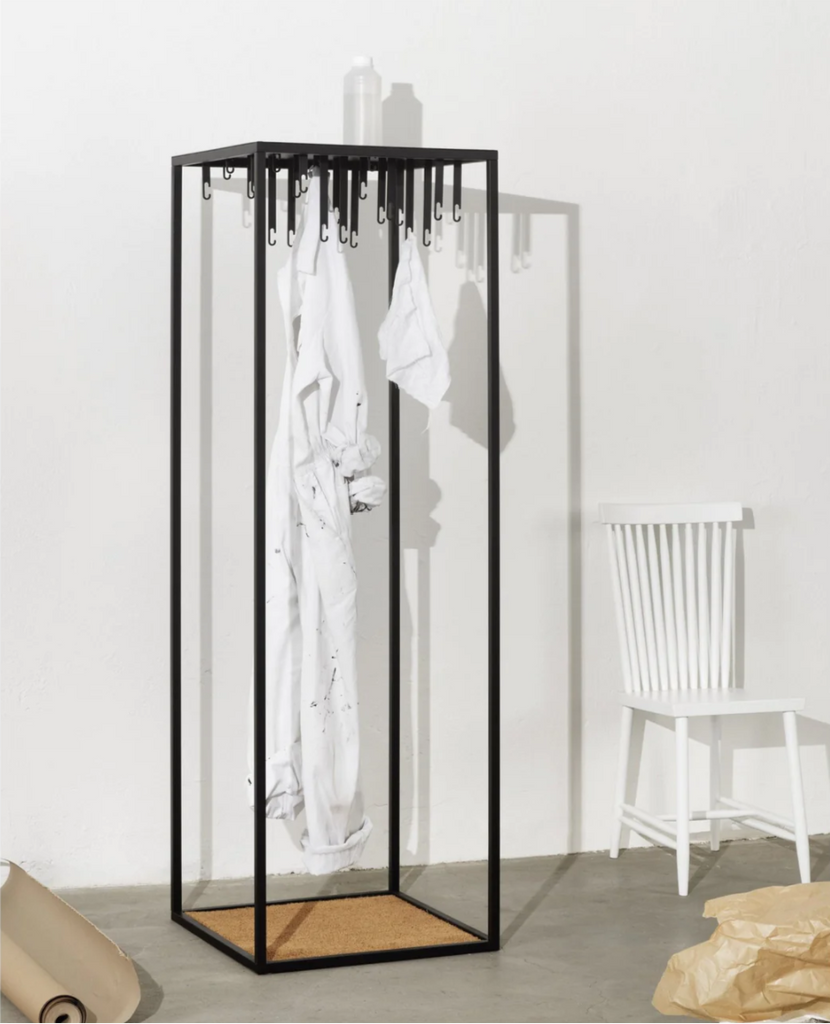 atelier coat hanger with shirts and coats