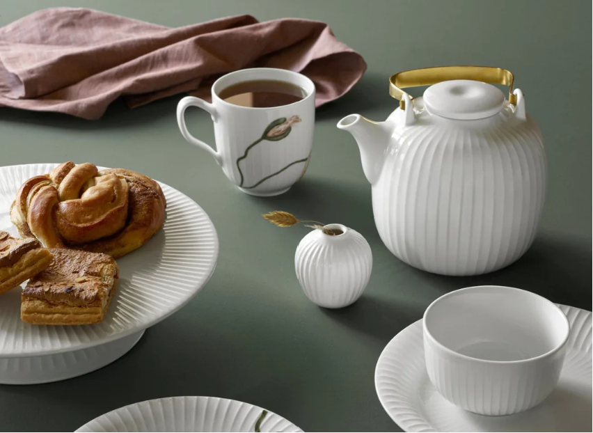 hammershoi teapot with plates tea cups and breakfast items