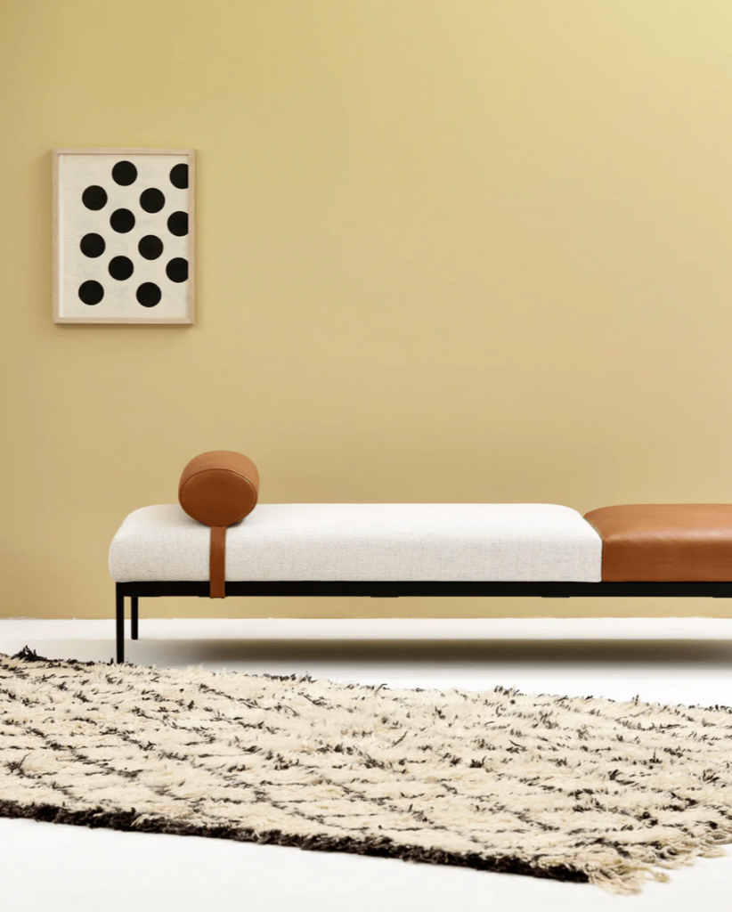 bon daybed against yellow wall