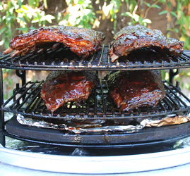 large-big-green-egg-smoking-4-rib-racks-rig.jpg__PID:39db79b9-535c-494a-b894-e2c9c58f4895