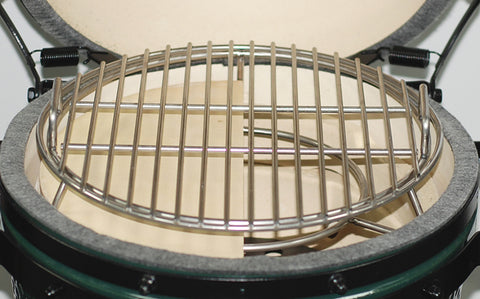 MiniMax Big Green EGG Expander with one half-moon deflector and cooking grid set-up inside the MiniMax EGG.