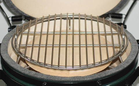 MiniMax Big Green EGG Expander with pair of half-moon deflector and cooking grid inside the MiniMax EGG.