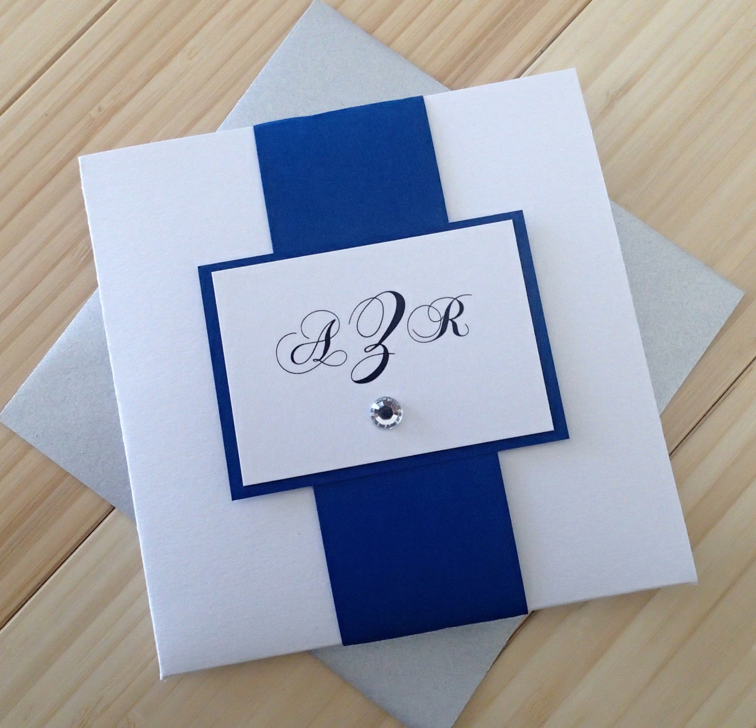 square-pocketfold-invitations-navy-pearlised-white-embossed-envelopes