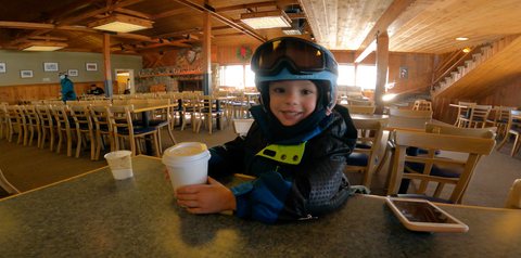 kyler sipping hot cocoa getting pumped to ski june mountain