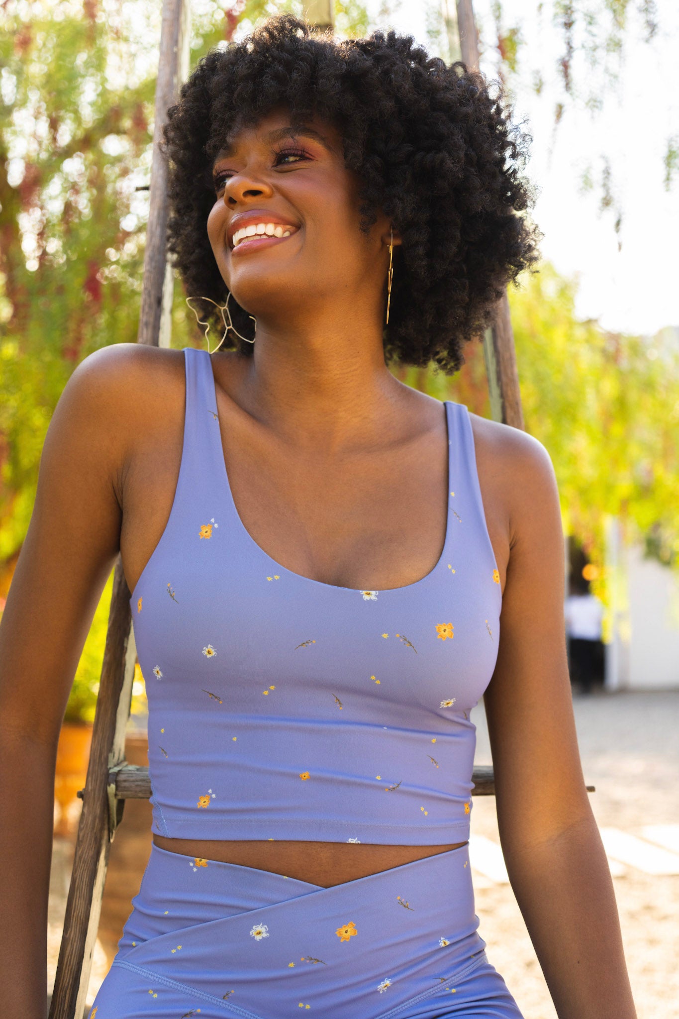 Model wears storybook crop from the POPFLEX cottagecore collection, cute activewear athleisure crop top
