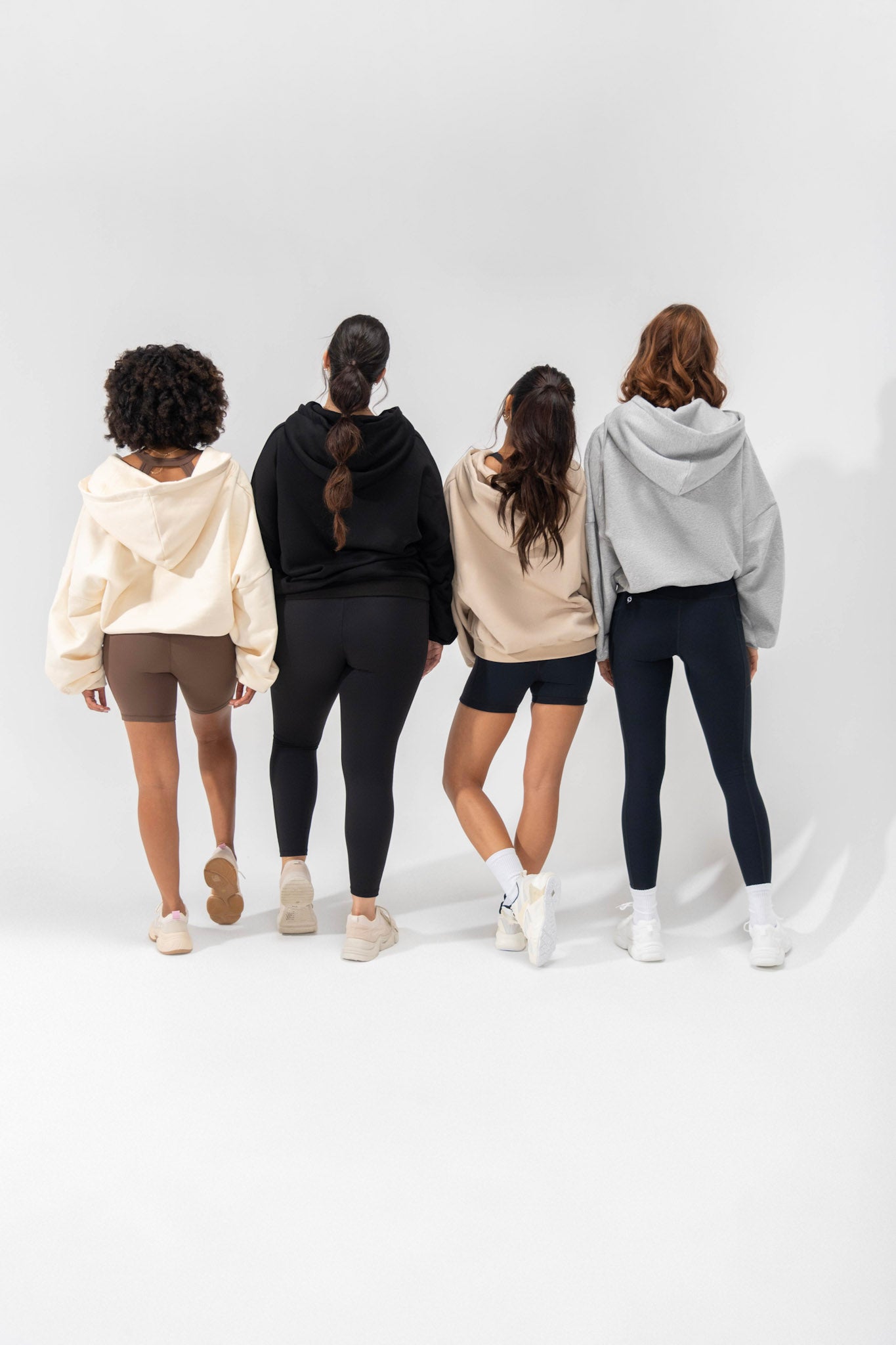 models wearing popflex cloud hoodie and cute activewear from basics collection