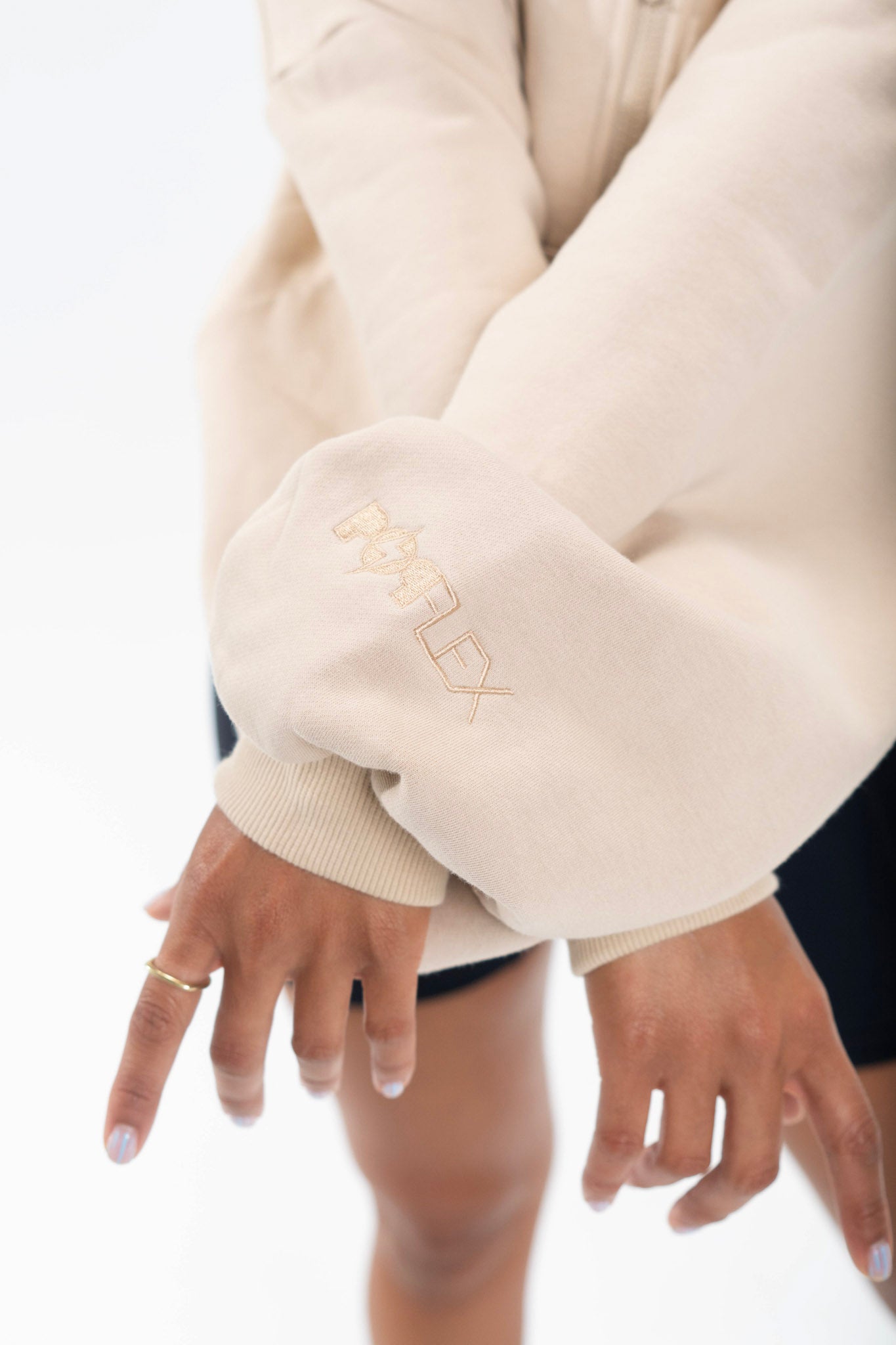 sleeve detail from cloud hoodie with POPFLEX embroidery on cute activewear