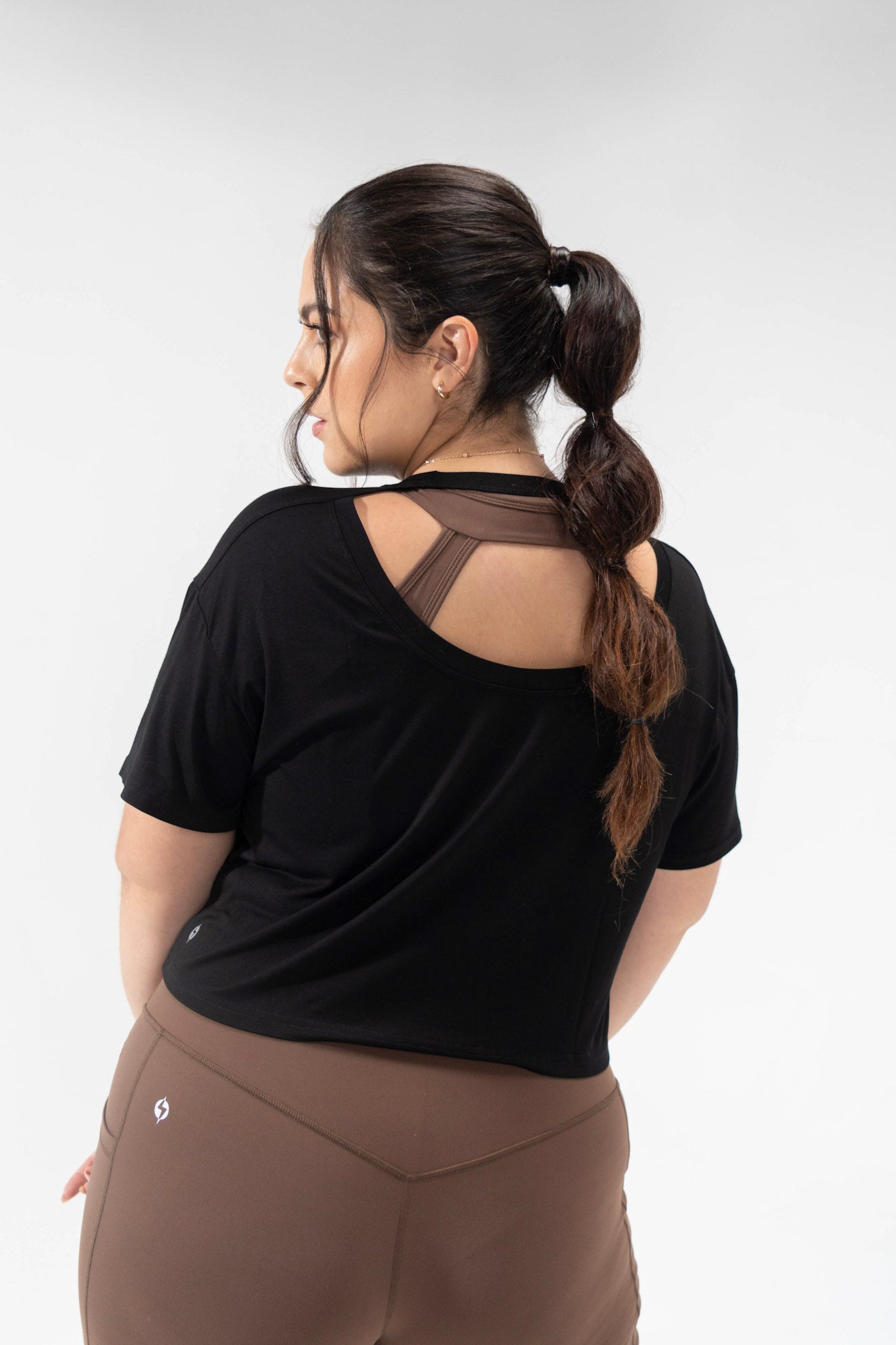 model wears plus size cute activewear tee, the cropped Explore tee from the POPFLEX basics collection