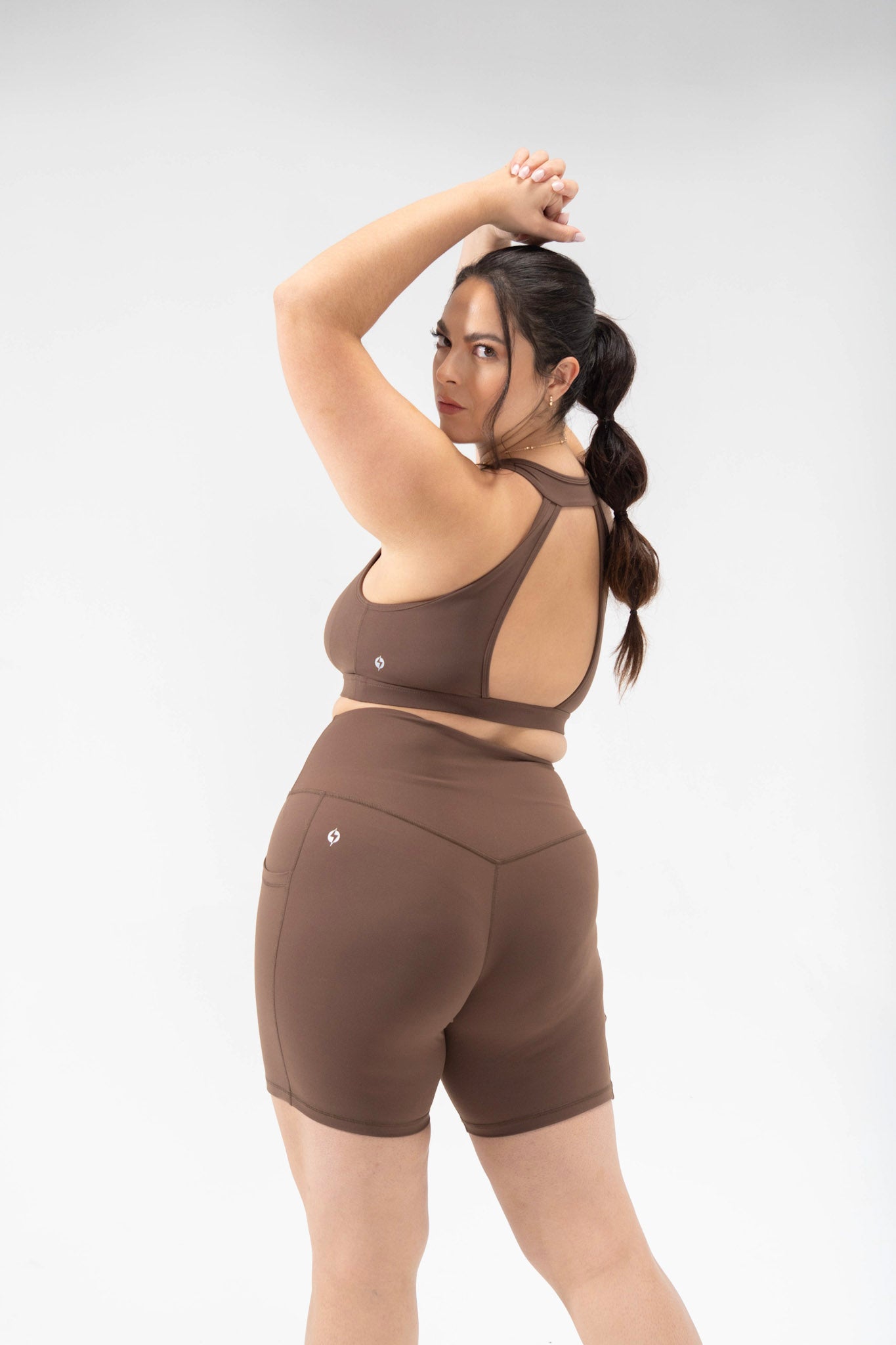 model wears plus size neutral biker shorts, cute activewear POPFLEX basics collection supersculpt shorts