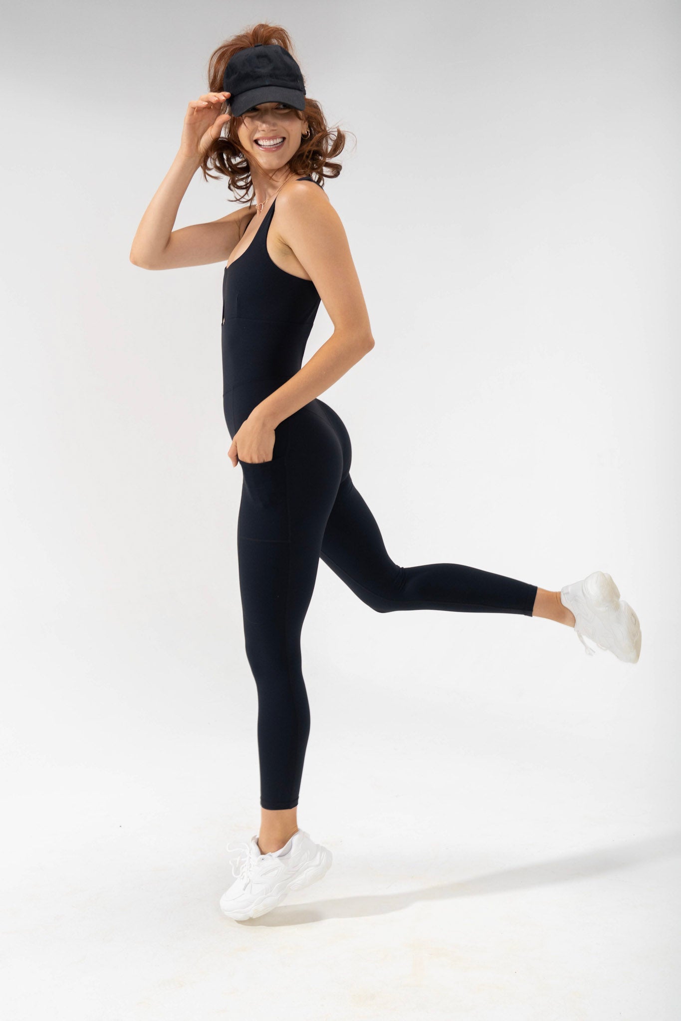 peek-a-boo onesie, model wears POPFLEX basics collection cute activewear workout onesie
