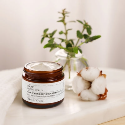 moisturiser for sensitive skin evolve organic skincare on table with cotton flower