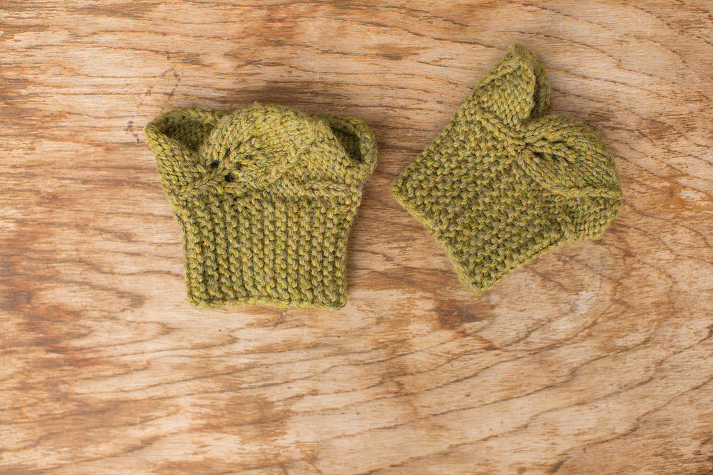 Green cuffs! Handmade by the TOM BIHN Ravelry group for the TOM BIHN crew.