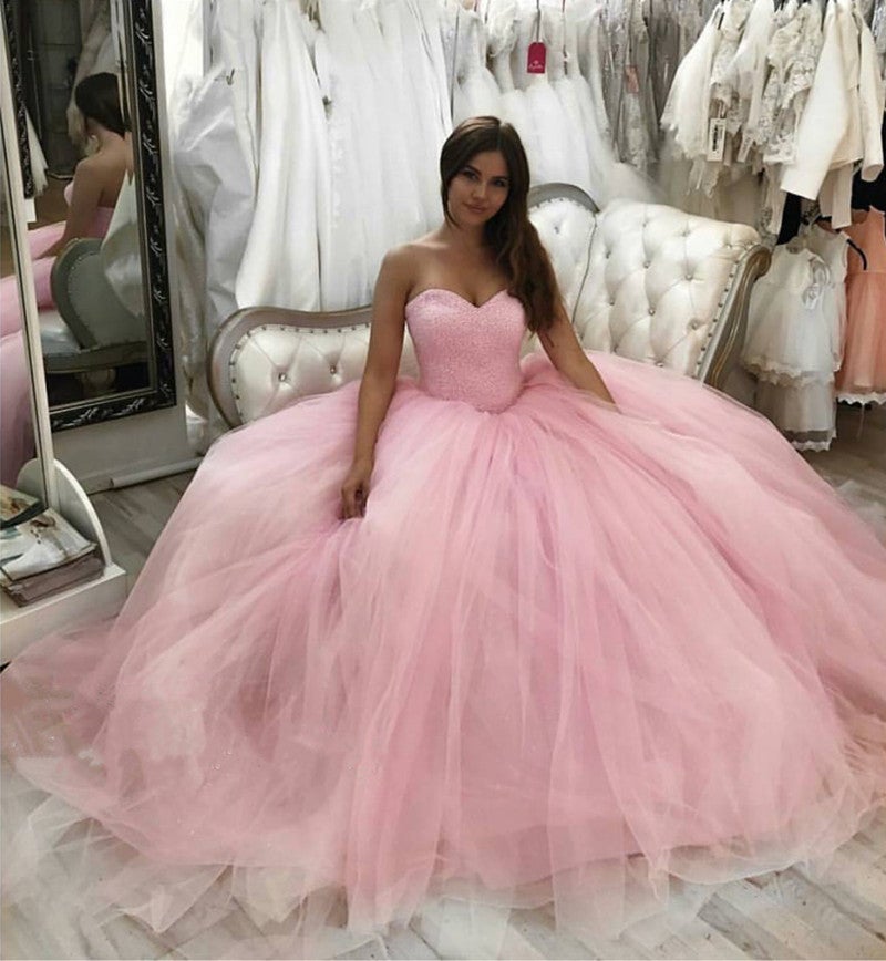 pink puffy quinceanera dresses