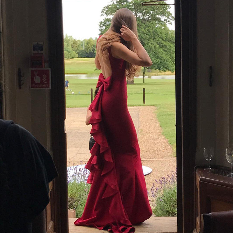 red prom dress with bow on the back