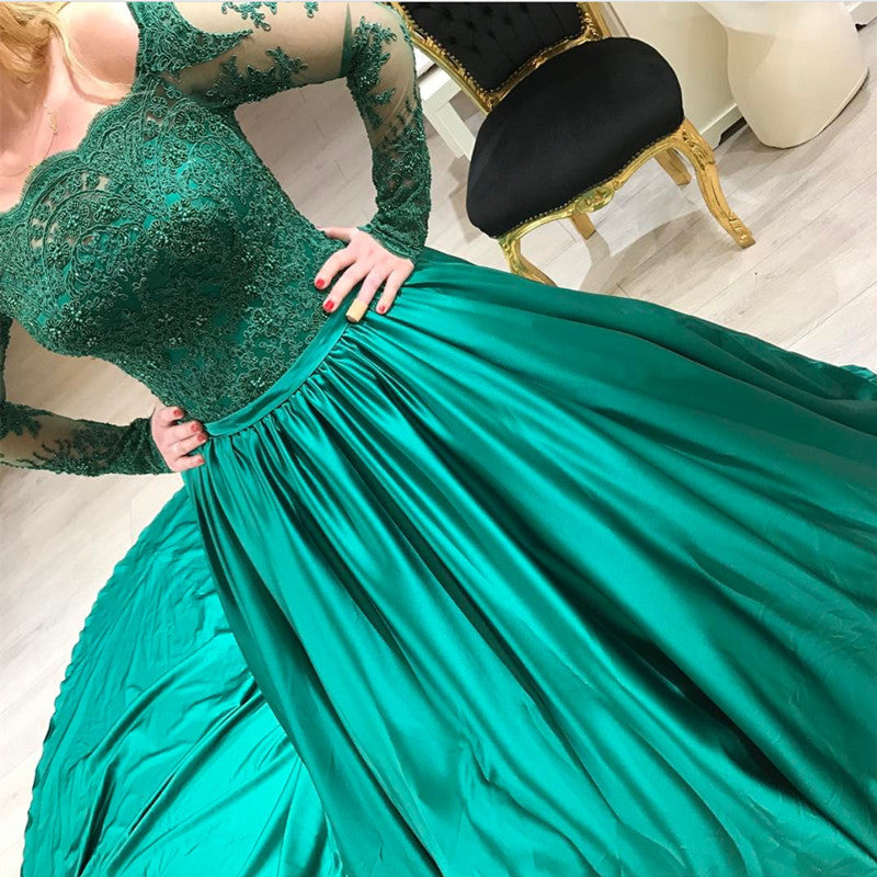 green ball gown with sleeves