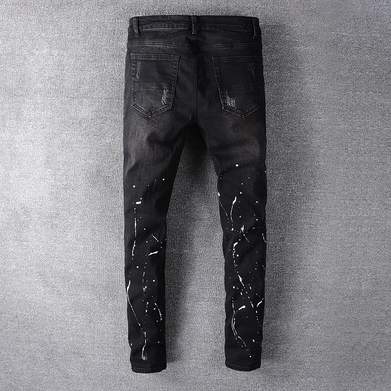 mens black jeans with paint splatter