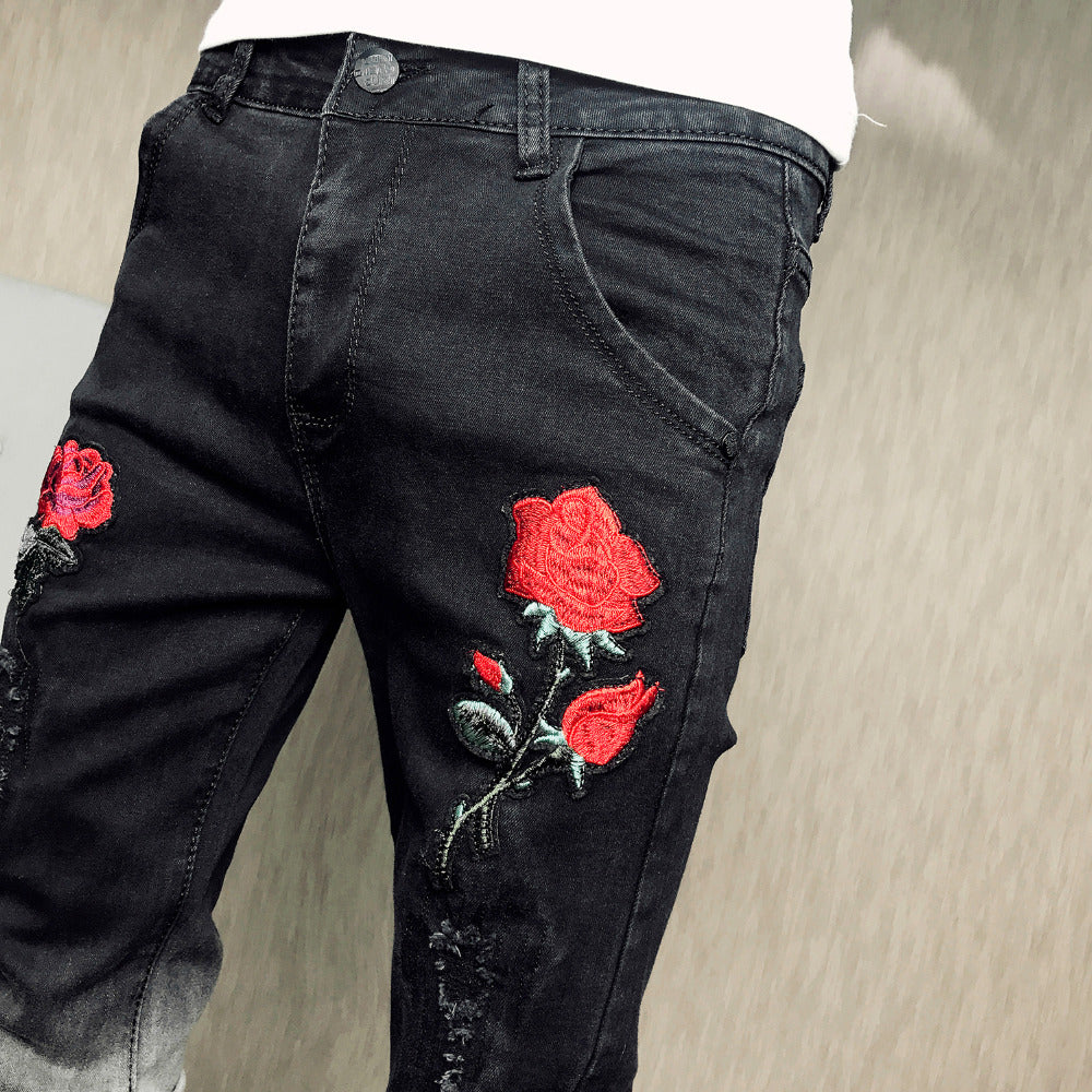 black jeans with red rose embroidery