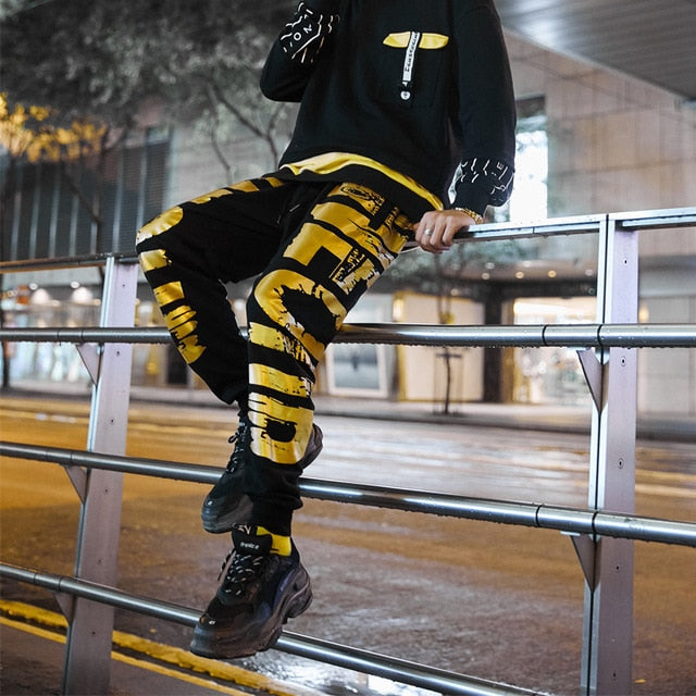 black and gold joggers mens