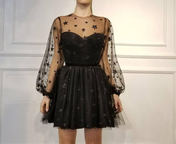 sheer black dress with stars