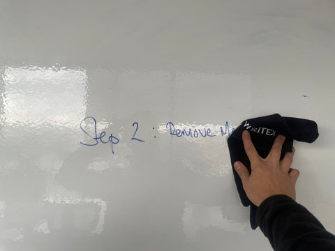 remove whiteboard stains with a marker