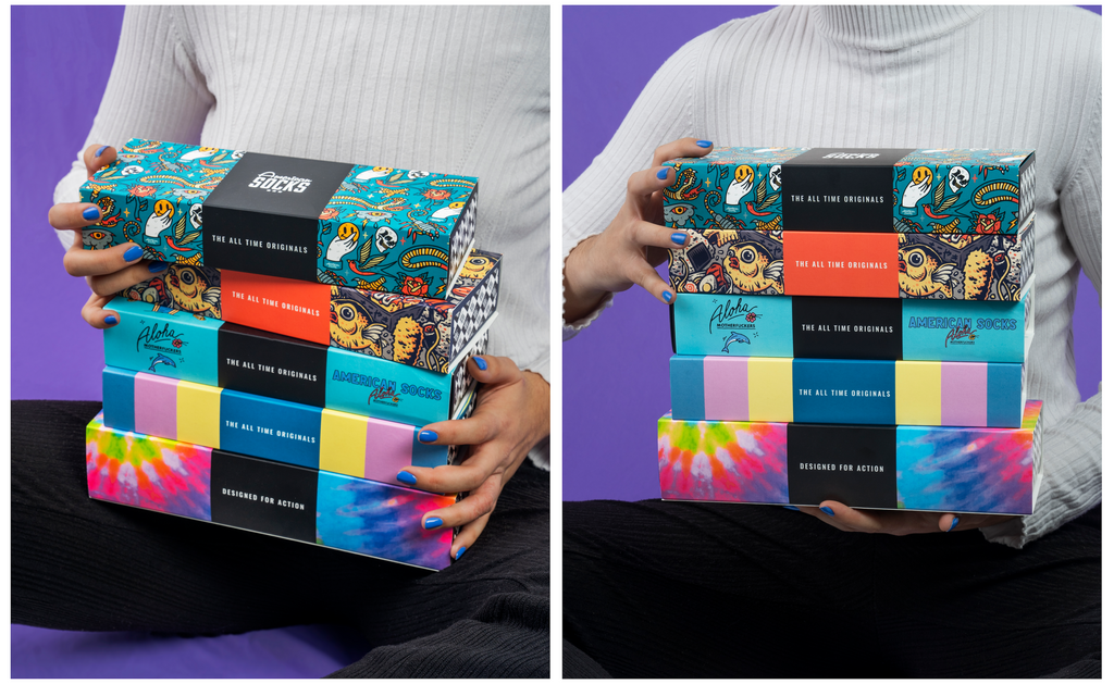 hands holding the american socks giftboxes