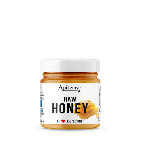 A jar of Apiterras original raw honey