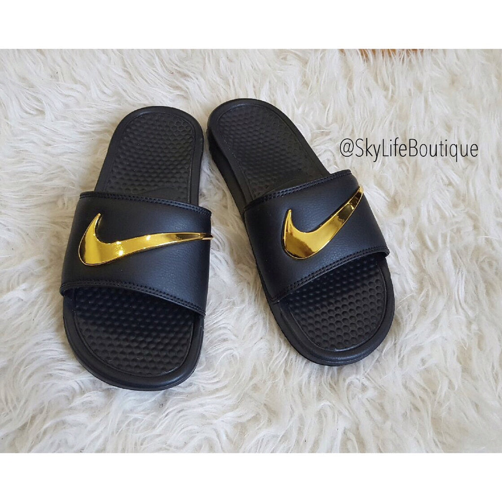 burgundy nike slippers with gold check